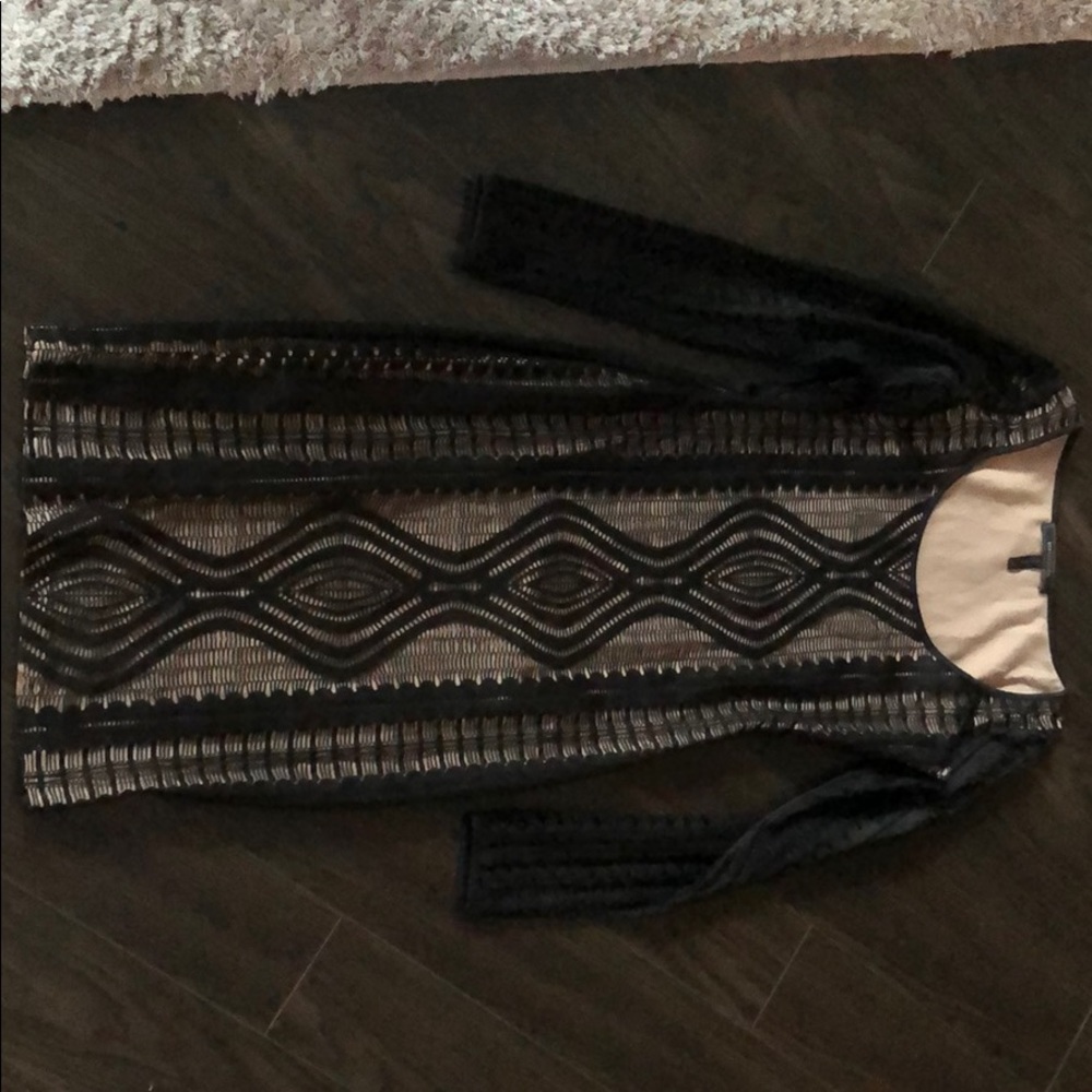 Tight fitting long sleeve midi dress